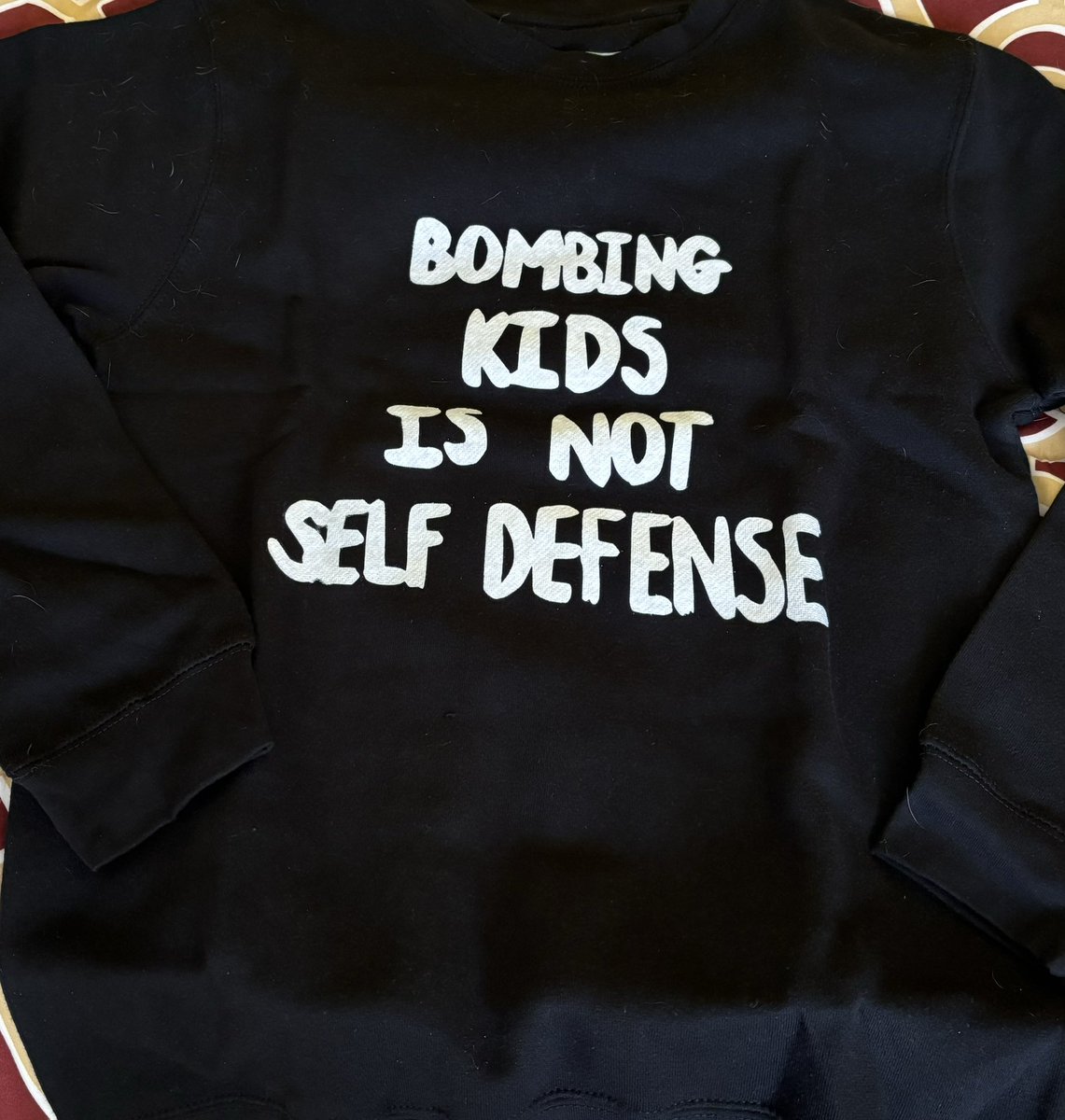 I love wearing stuff like this out in public because it shows you who has humanity and who is a genocidal monster.