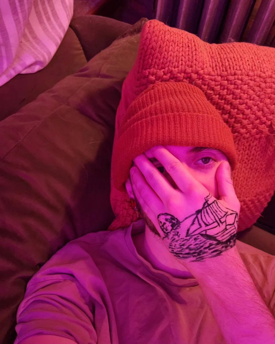 owns an orange hat tweet media