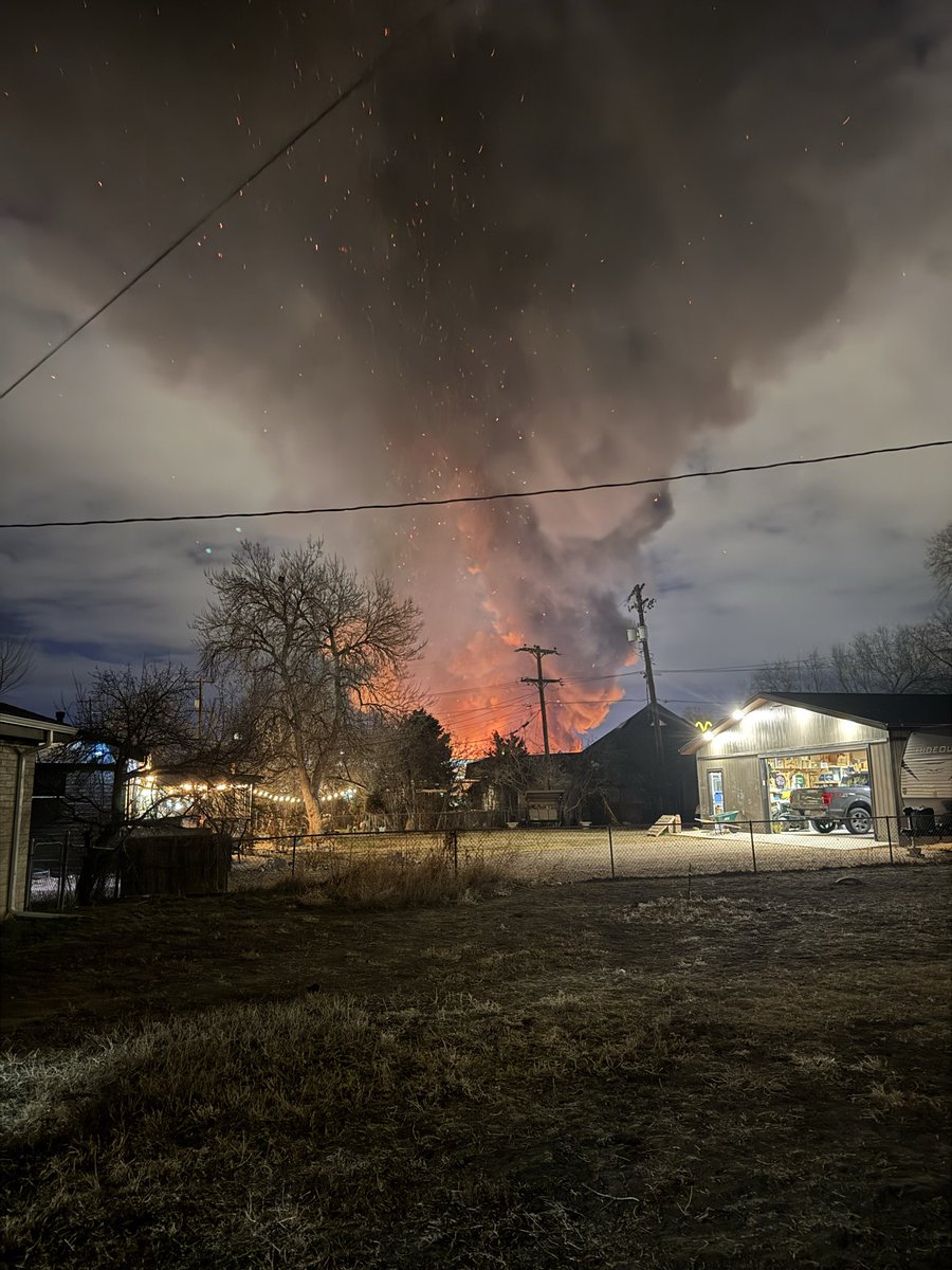 Garfinkus's tweet photo. @susancharmich @MileHiSandy Open construction, drought, and wind carrying the embers and blowing it around. I’m a half mile away and here’s my view and the chunks falling from the sky https://t.co/KgQUeOcOnS