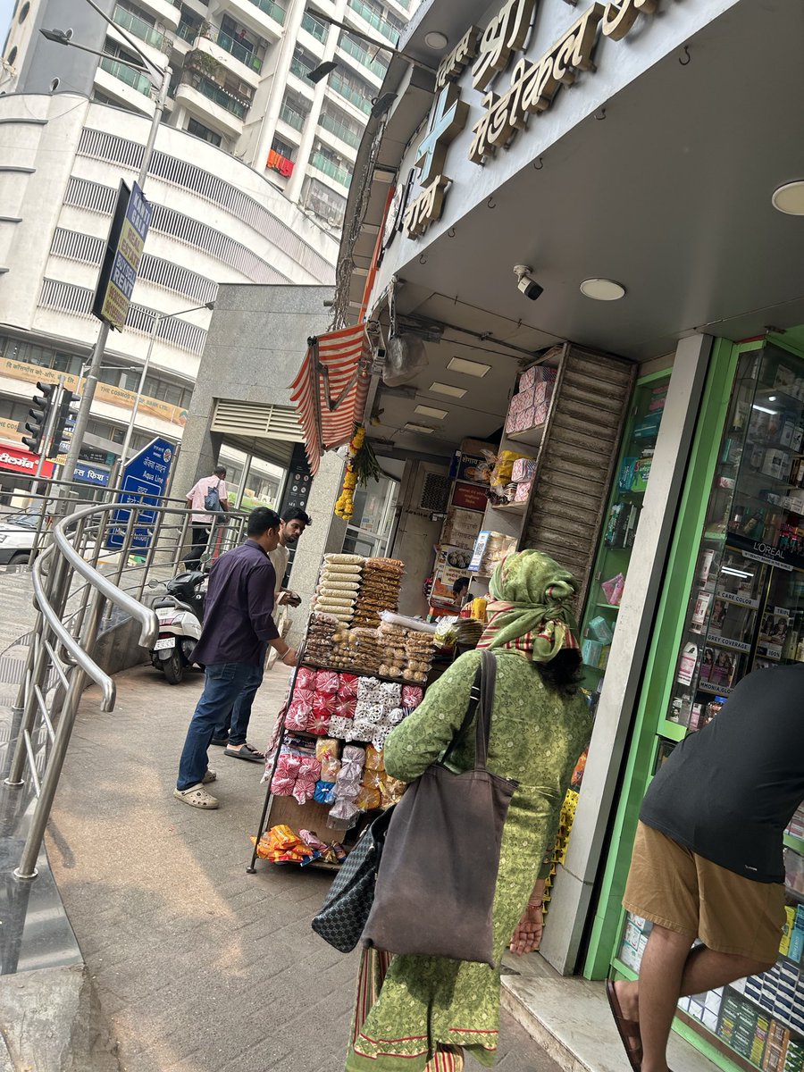 This shop at Junction of Ranade Road and Gokhale road near railing of Dadar Metro Station A2 gate encroaches on the already narrow footpath with Farsan table leaving less space to walk. Pls take necessary action <a href="/mybmc/">माझी Mumbai, आपली BMC</a> <a href="/mybmcWardFN/">WARD FN BMC</a> <a href="/MumbaiMetro3/">MumbaiMetro3</a>