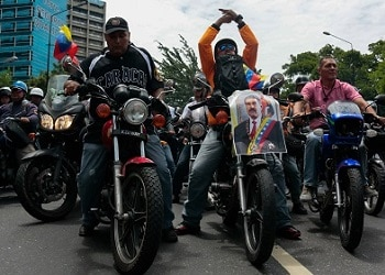 alextran_78's tweet image. Venezuela shaken on Jan 3

Early on Jan 3, 2026, Venezuelan state TV cut regular programming following explosions and U.S. strikes in Caracas. Footage showed pro-government “motorizados” deployed across the city. 

The move came after Donald Trump claimed U.S. forces had captured…