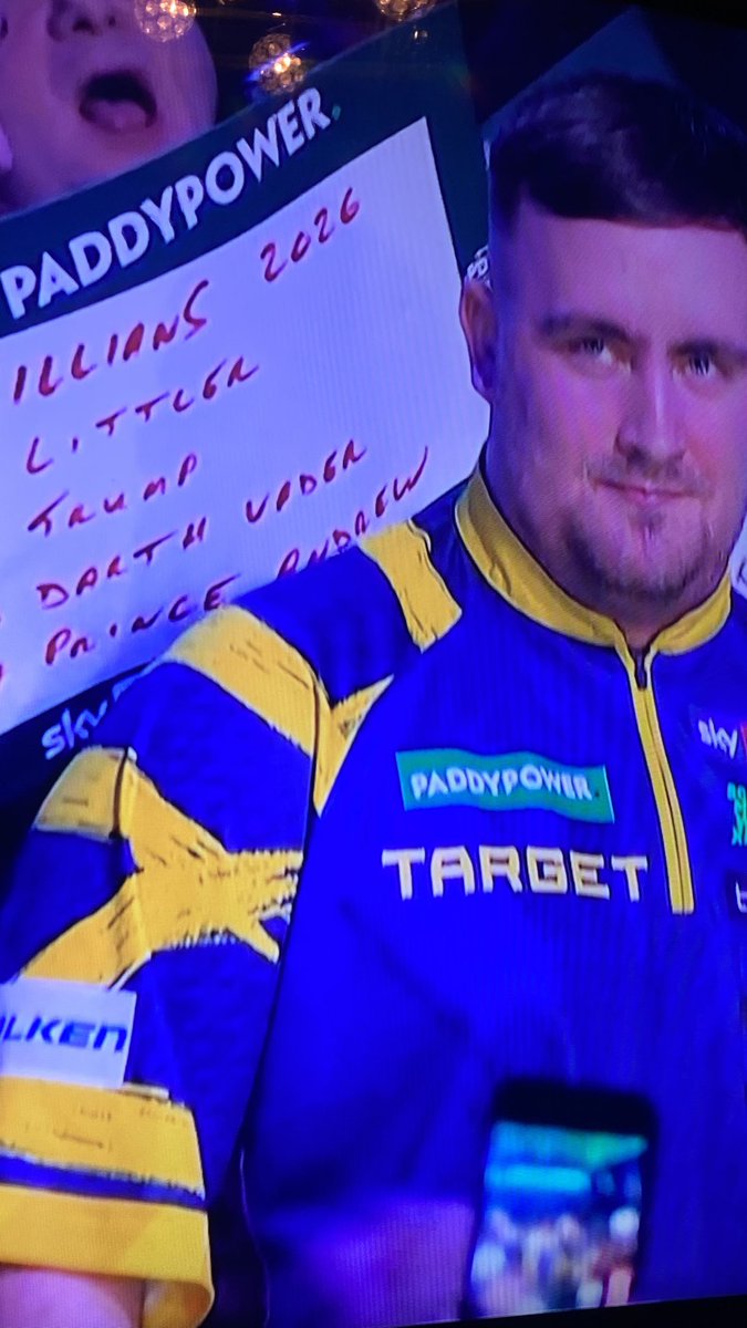 bysamrobinson's tweet photo. Absolute belter of a sign 😭  Trump, Littler, and Prince Andrew all in one place😂😂 #darts #pdc #littler #trump https://t.co/OfV2nmriT6