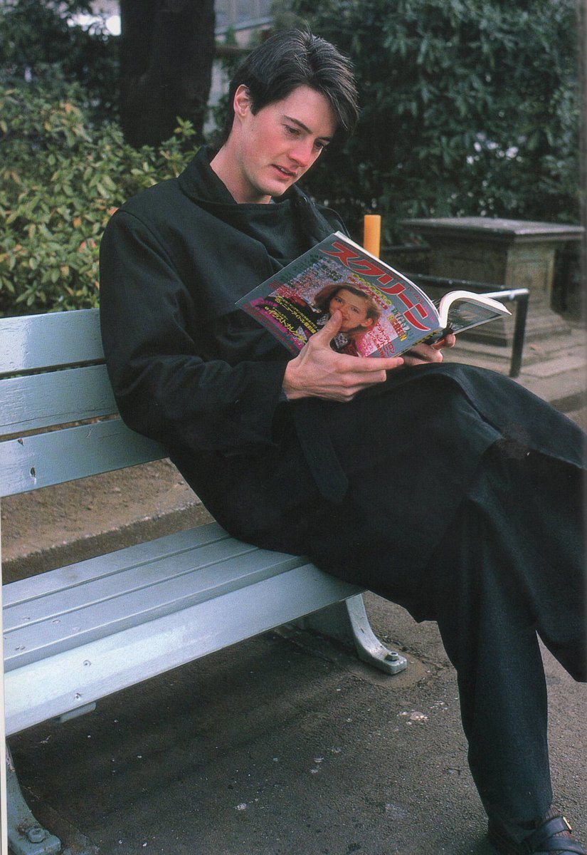 objectfetishist's tweet image. Kyle Maclachlan reading Japanese magazines during a visit to Japan in the early 90s. Scanned from “Kyle Maclachlan: Mysterious Prince.”