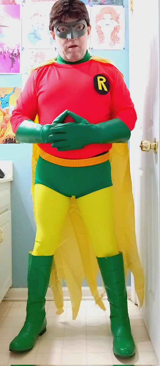 LenhardtEric's tweet photo. Okay here's my first cosplay of 2026! I put together this cosplay of Earth 2 Robin last night π I will add a few more in the comments section #cosplay #Earth2 #earth2robin #thriftstorefinds #greenlanternmask #redshirt #yellowleggings #greengloves #greenboots #shortshorts #2026 https://t.co/FP46XrA8ku
