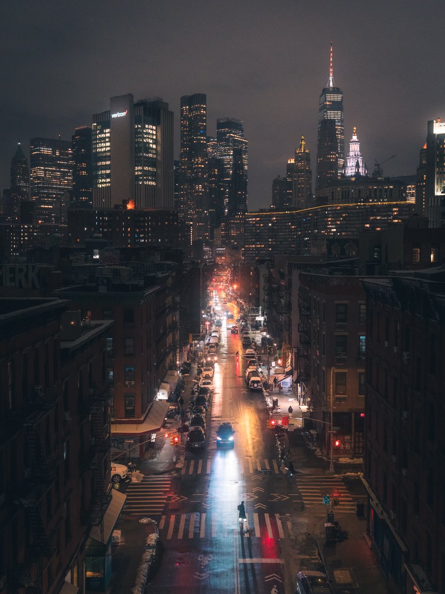 Dancing City Lights, A Mesmerizing Display on the Night Street. Generative  AI 27078515 Stock Photo at Vecteezy, image size:900x1200