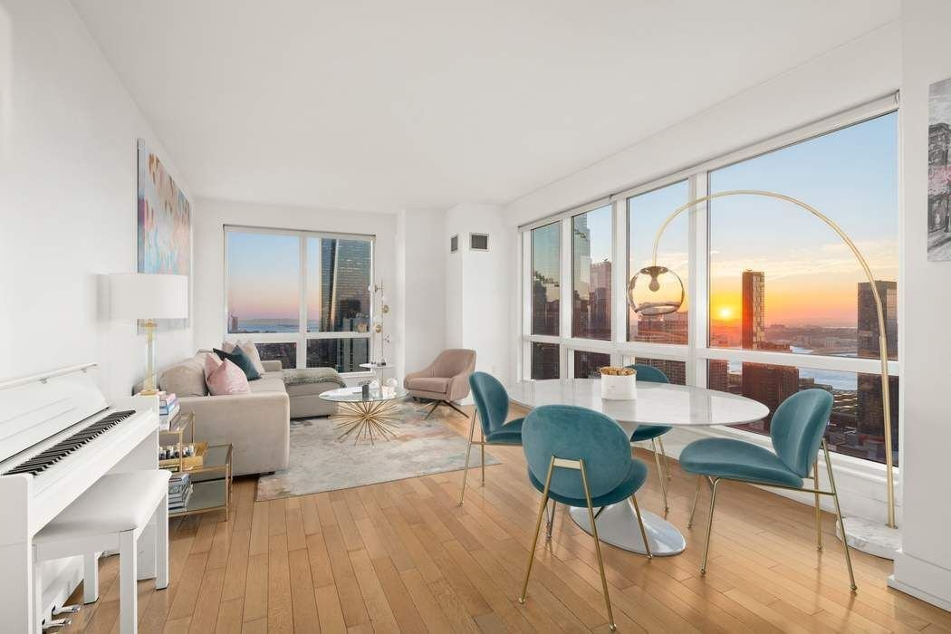 sofia70649's tweet image. Stunning high rise living room with floor-to-ceiling windows showcasing an epic sunset view 🌅, elegant modern decoration, and a stylish dining nook. Perfect for luxury city lifestyle! 
#LuxuryRealEstate