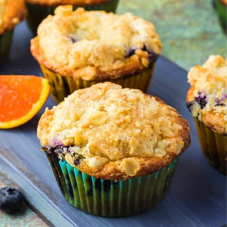 This Blueberry Muffins Recipe features a buttery crumble topping that adds irresistible flavor and texture to every bite. #blueberrymuffins #muffins #breakfast #snack #treat #blueberries melissassouthernstylekitchen.com/blueberry-muff…
