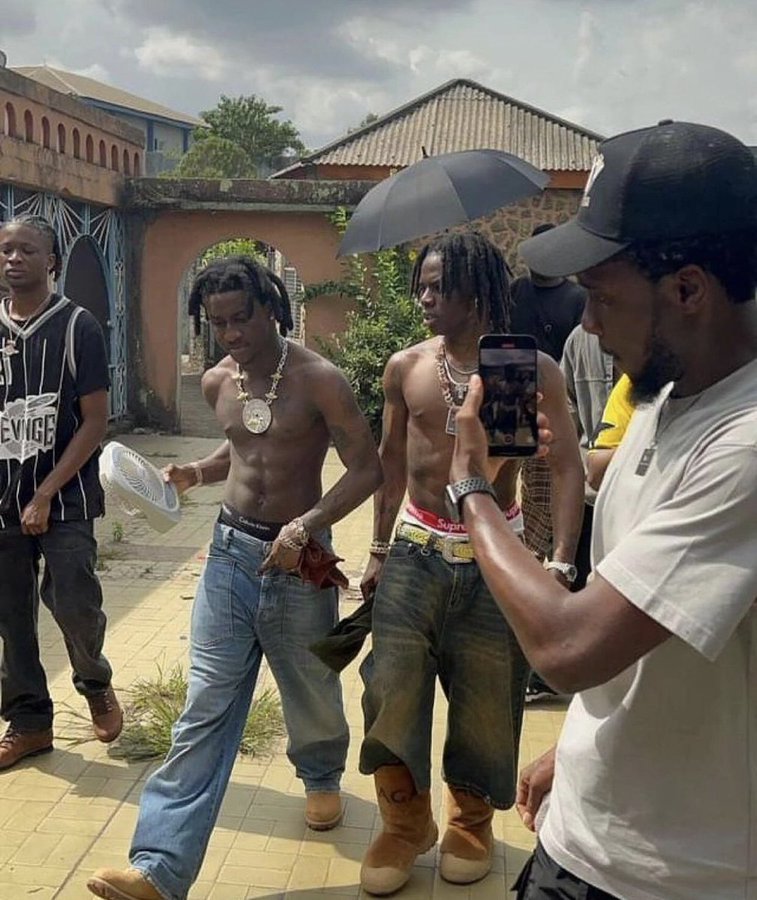 wisdomgodfre's tweet image. Throwback pic of Rema and Shalipop in Benin during their 2024 video shoot for 'Benin Boys' 🦇🪐