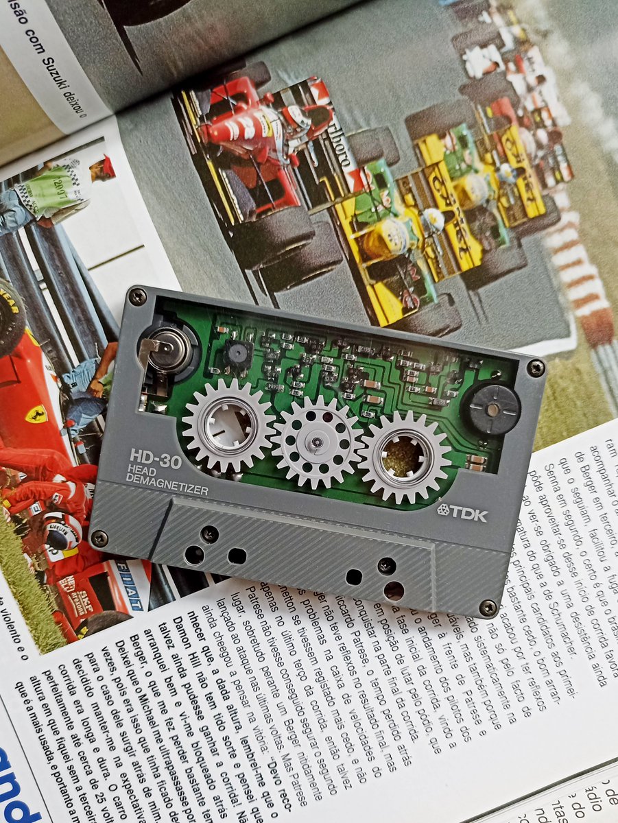 TapesFans's tweet photo. Head demagnetizer from TDK. On the background of a Portuguese book about #Formula1 / #F1 of 1993. #C60 #C90 #audiocassettes #compactcassettes #vintageaudio #analog #BASF #sony #tdk https://t.co/9nqPMxvYiR