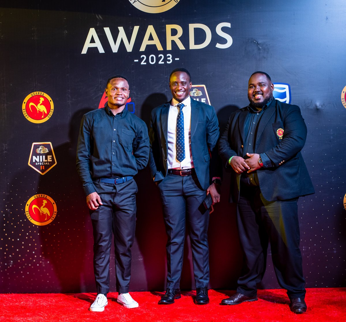 . @Uganda_Sevens players @adriankasito, @WilliamNkore and @RugbyCranes player at @RuhwezaA at the #URUAwards2023