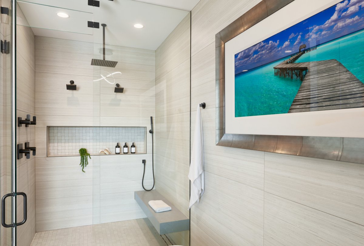 It's easy to create a luxurious space with porcelain tile! This sophisticated walk-in shower features Shibusa Bianco 24x48 on the walls, Shibusa Bianco Basketweave 2x2 Mesh on the floor, and an Oxide Quartz bench. Click here to learn more: ecs.page.link/Aijwt 

#arizonatile