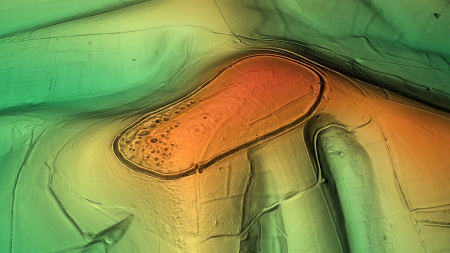 AntiquityJ's tweet photo. This is lidar of Cissbury Ring, an Iron Age hillfort in West Sussex and the second largest in England. It captures the pockmarks left on the hill by earlier Neolithic flint mines. #FridayLidar 1/2 https://t.co/7S3wqfjGC6