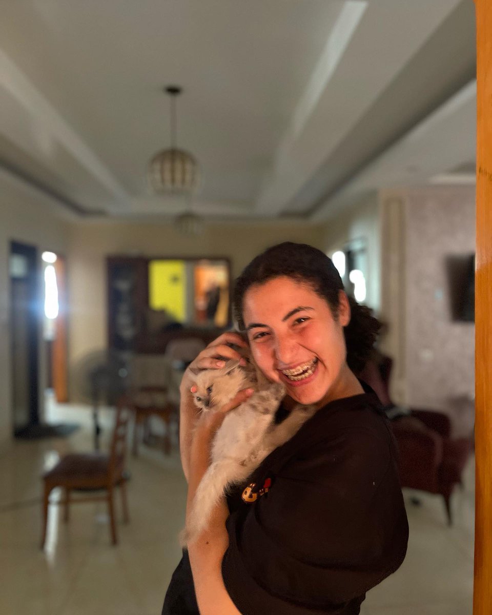 GaZaVoice7th's tweet photo. This is me, and my cats in my home in Gaza city.
The home was bombed and destroyed yesterday, I don’t know where are my three kittens and Gaza city is destroyed.
This is our lives in Gaza Strip right now, a nonstop nightmare, we lost everything. https://t.co/SY4FCvYVgM