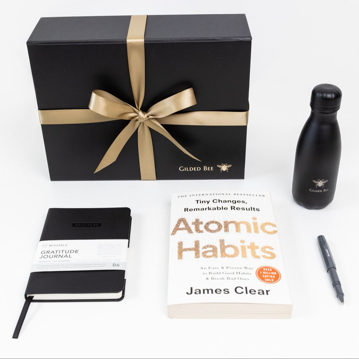 GildedBeeStudio's tweet photo. A brilliant way to stand out from the crowd is through new year corporate gifts. Many of our thoughtfully curated hampers are designed around the themes of success, energy and commitment. 🚀 Get in touch today @GildedBeeStudio https://t.co/UsY6uoOI0S