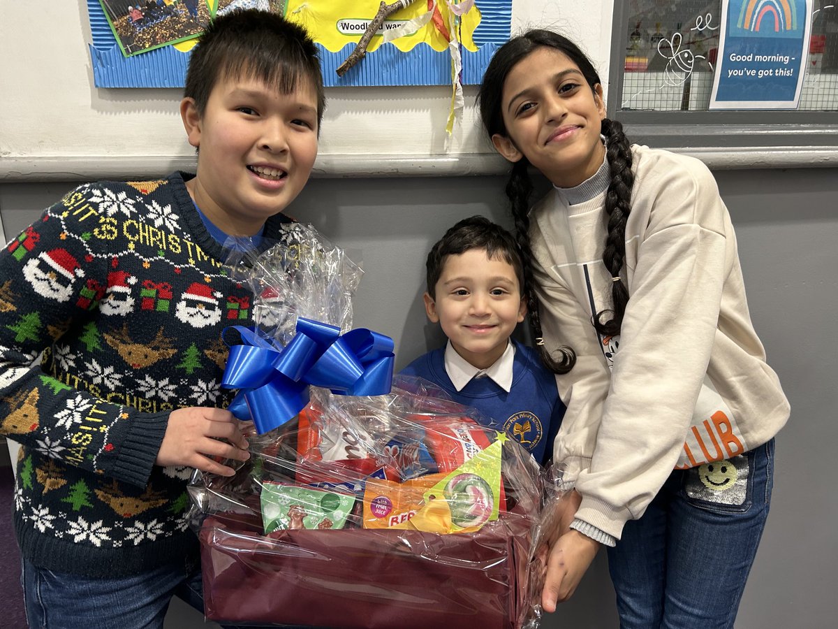 MrsMorrisNP's tweet photo. Thanks to everyone who donated to our winter fair hampers. Our head boy &amp; girl pulled out the name of this lucky donator who has won a fabulous chocolate hamper. Don’t worry, we’ve 22 more hampers in our auction at 3:45pm today. #nppschevents #nppschptfa #christmasjumperday https://t.co/GC0YQIRqV2