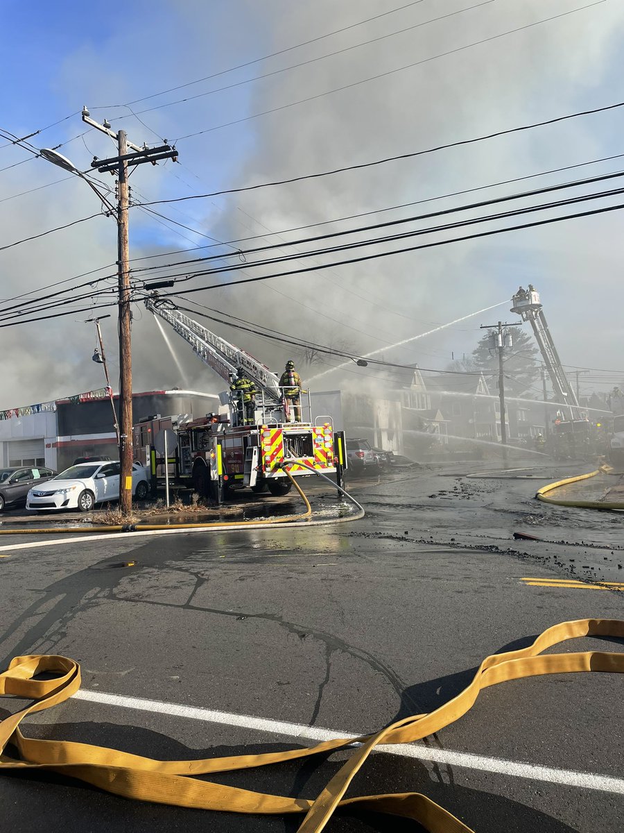 Scene from the massive fire on Main Street in Manchester this morning. Fire crews are still working on putting out the hot spots at Capitol Automotive <a href="/FOX61News/">FOX61</a>