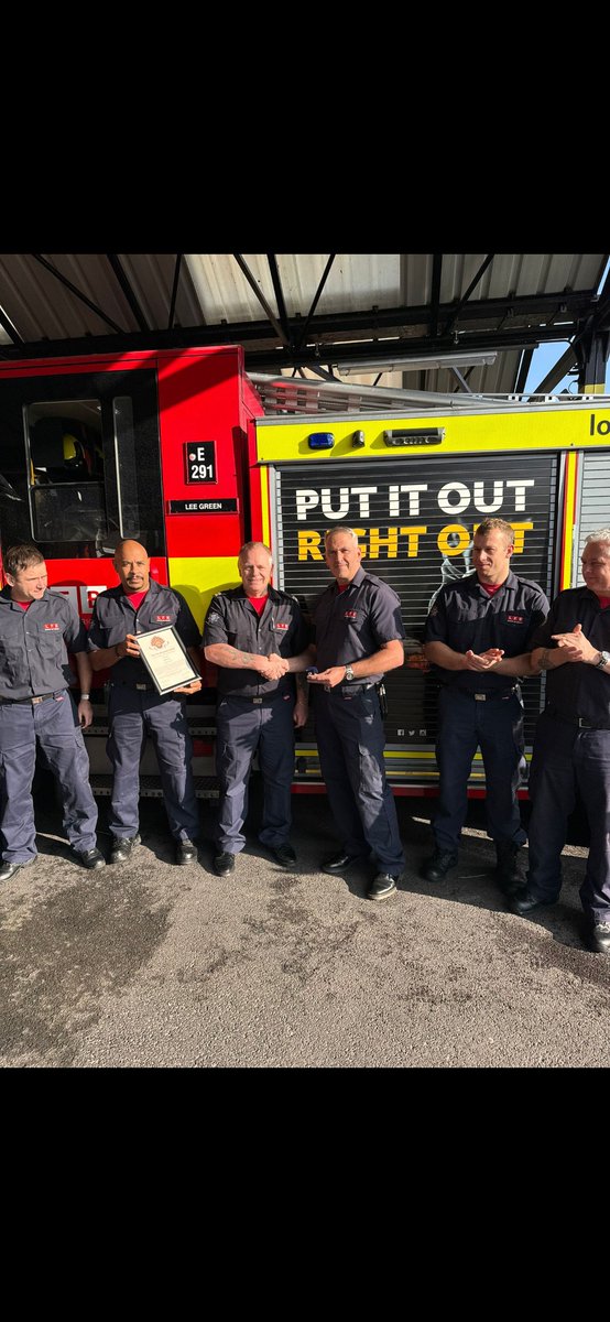 LFF Denis Martin E29 Lee Green Red Watch receives his 25 year Pin & Certificate from Toby Walsh South East Area Mental Health Rep, Lewisham Borough H&S.