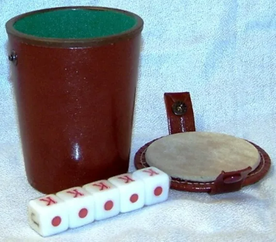 cubiletecup's tweet photo. For the standard Cubilete game, the players sit down around a table. Each player, in its turn, places the five dices inside the glass, shake them to revolve them and utilizes the same glass to throw the dices on the table.

#cubilete #cuban #dicegame #dice #app #game https://t.co/orE7Q0ch5h