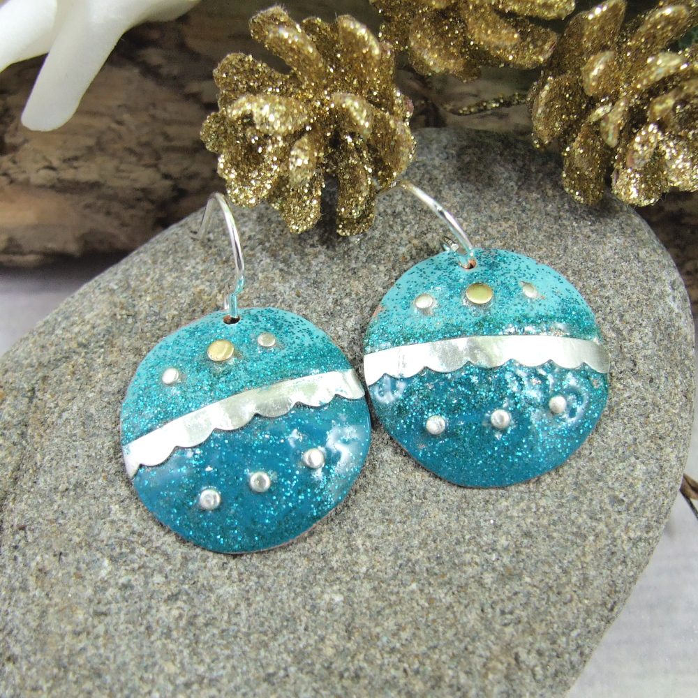 These are very festive and no one else will be wearing the same at the office party. Christmas Bauble Earrings Green. Copper, Sterling Silver & Enamel thebritishcrafthouse.co.uk/product/christ… #tbchboosters #handmadejewellery #christmasjewellery