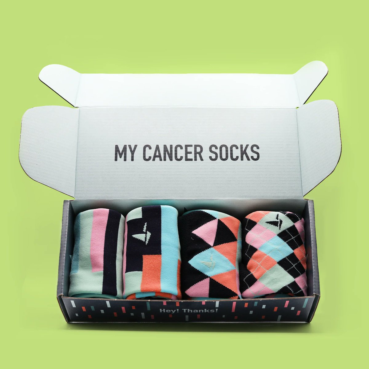 hankgreen's tweet photo. You should buy my cancer socks to celebrate, because we don't have to live in a world where folks don't get the same access to treatment, or one where you socks are boring and the profit goes to some stranger. (And yes, I gave my doctor some socks.)

https://t.co/FXHzizZtN5 https://t.co/oAyA9P66FD