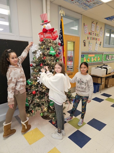 School No. 6: Alayna Roman, Antonina Domaradzka, and Luciana Guaman Vasco, decorated the School No. 6 Giving Tree for our annual Holiday Gift Drive. <a href="/LindenPS/">Linden Public Schools</a> <a href="/AtiyaYPerkins/">Atiya Y Perkins Ed. D.</a>
