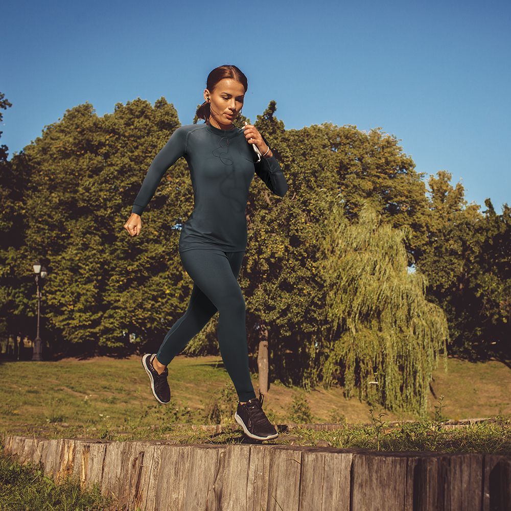 Designed for versatile wear. Perfect for layering or as a top for chilly weather runs! #engineeredformotion #turtleneck #layertop #layering #baselayer #sporting #sportinggoods #sportgear #gearsport #running