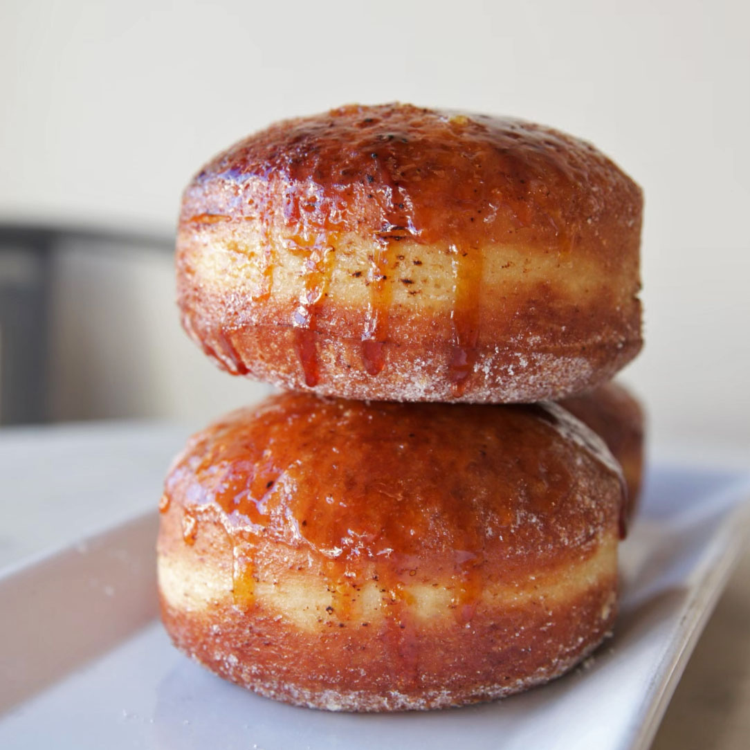 ICYMI: Santa's Little Helper launched last weekend! 

Our newest seasonal flavor features a Bismark filled with luscious maple bourbon pastry cream and crowned with a brûlée top for a perfect blend of warmth and sweetness. 😋😊 Served Fri, Sat, Sun

Come try it this weekend!