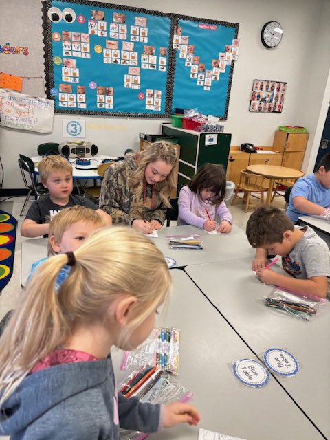 WauseonPrimary's tweet photo. FFA students from @WauseonHigh visited our students today for a fun coloring activity! #WauseonPride https://t.co/9T1gvIFIJi