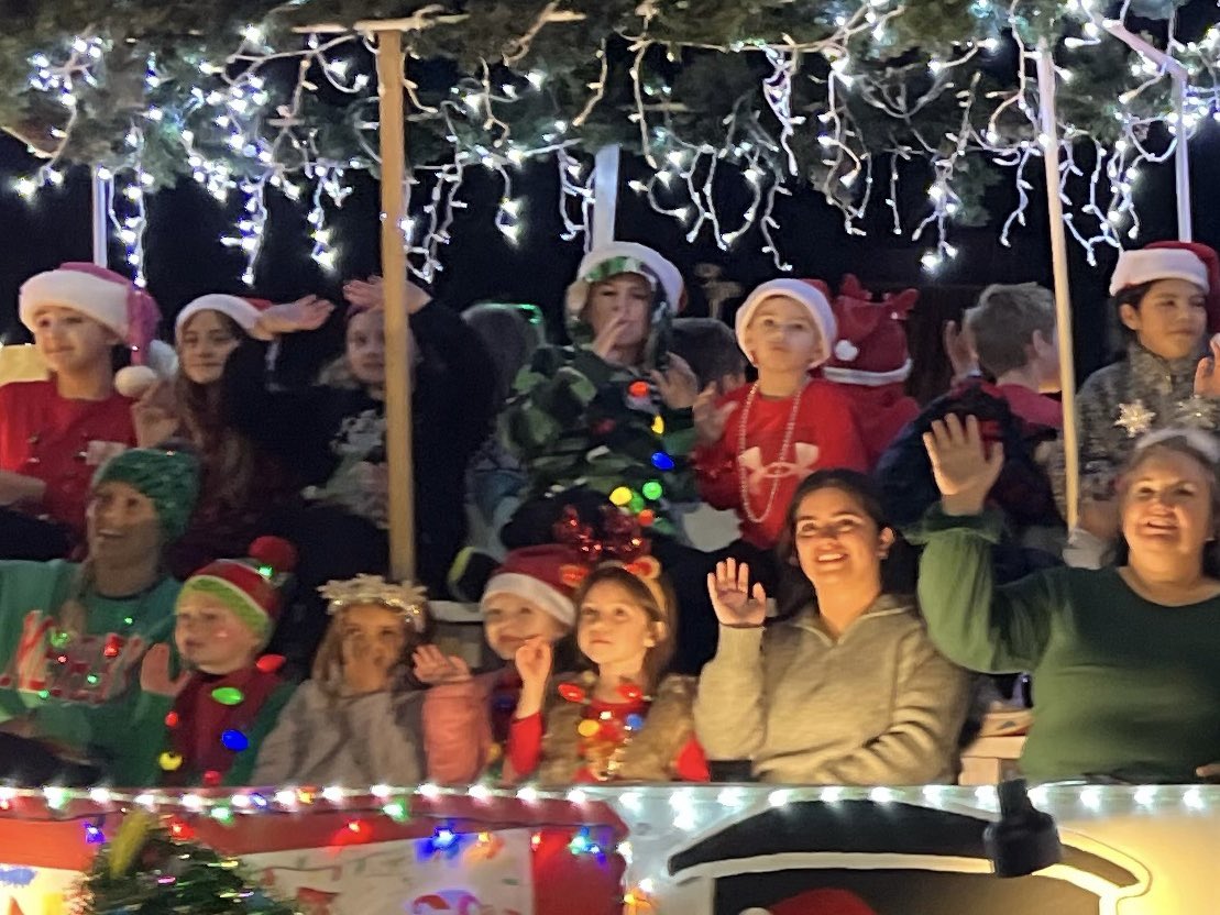 OquistDiane's tweet photo. I always look forward to the Grapevine Parade of lights. Dove Elementary School you did a great job on our float once again. Love seeing all those festive dolphins riding on the float and I even ran into our very own Officer Day.  #DESisBEST https://t.co/6zU8VoLtPg