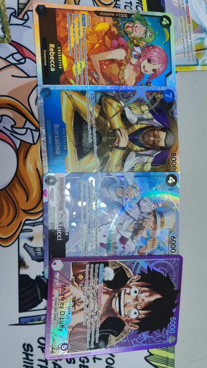 helrib_'s tweet photo. What a great start to OP05 🔥
7c Doffy is the goat 👑
Also peep the pulls 👀 also got a Sabo SR which I forgot to include in the pic 😂 https://t.co/NTkK9TQy8v
