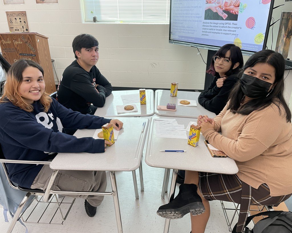 Leslie Renaud's Advanced Placement English III class works on a reasoning group activity using the childhood favorite book, "If You Give A Mouse A Cookie".