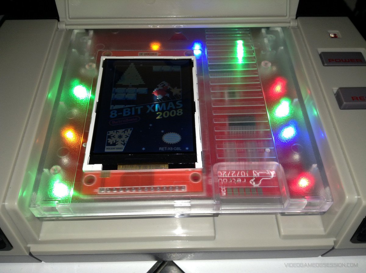 matthewhenzel's tweet photo. Holiday decorations. #RetroUSB 8-Bit XMAS 2017 cart (with blinking lights and an LCD display (for labels). It worked great at launch, but following bios updates made it buggy AF. Maybe someday it'll get fixed. Until then I recommend playing it on a Famiclone and not the #AVS. https://t.co/SJNkNpqzkQ