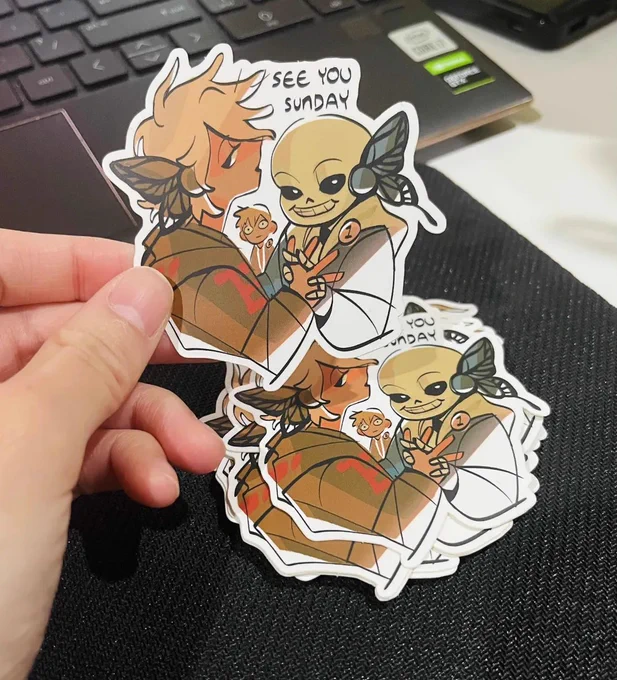 [rts ] my sh0p is live! restocked on project sekai and madoka charms, persona 5 /vampire oc/ sansmaeda stickers hope to have more death note sticker sheets in the next week  Iink below 