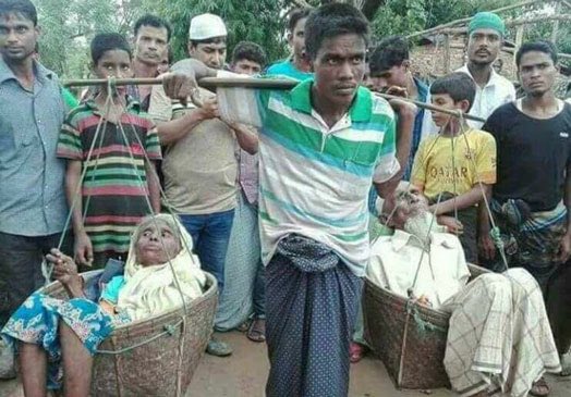 fasc1nate's tweet photo. In 2017, a Rohingya Muslim man carried his immobile parents close to 100 miles to escape death squads in Myanmar. It took him 7 days, but he eventually reached Bangladesh unscathed. https://t.co/wffbizLgfV