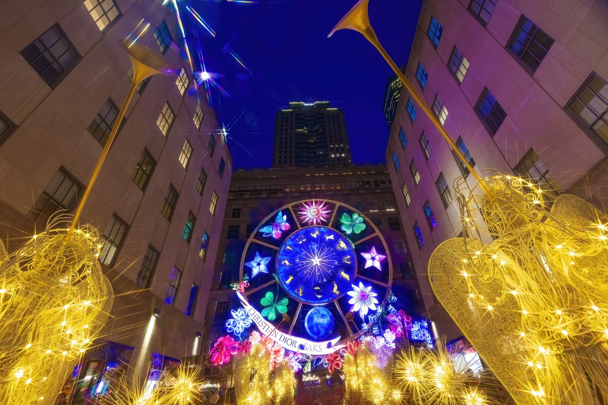 isardasorensen's tweet photo. New York City looks dazzling for the winter holidays now (pics: Rockefeller Center #Christmas tree &amp; angels, Wall Street tree, Empire State Bldg in #Hanukkah hues). #NYC #HappyHolidays https://t.co/4jJL0QfvJc