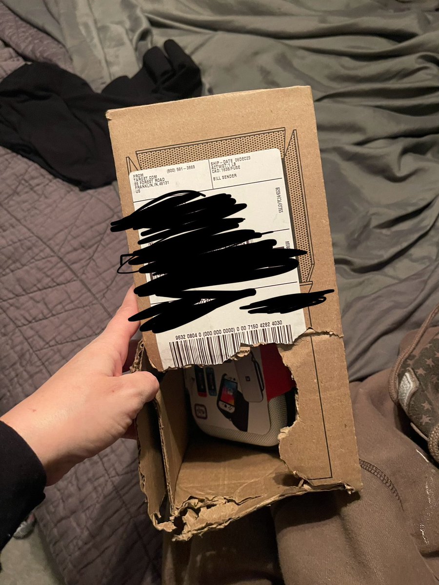 trisha_gingery's tweet photo. @FedEx No way he saw this where the label was huh? Hole was just the right size to pull what they thought was a Nintendo switch but was just a case. https://t.co/fdfjhs8LL7