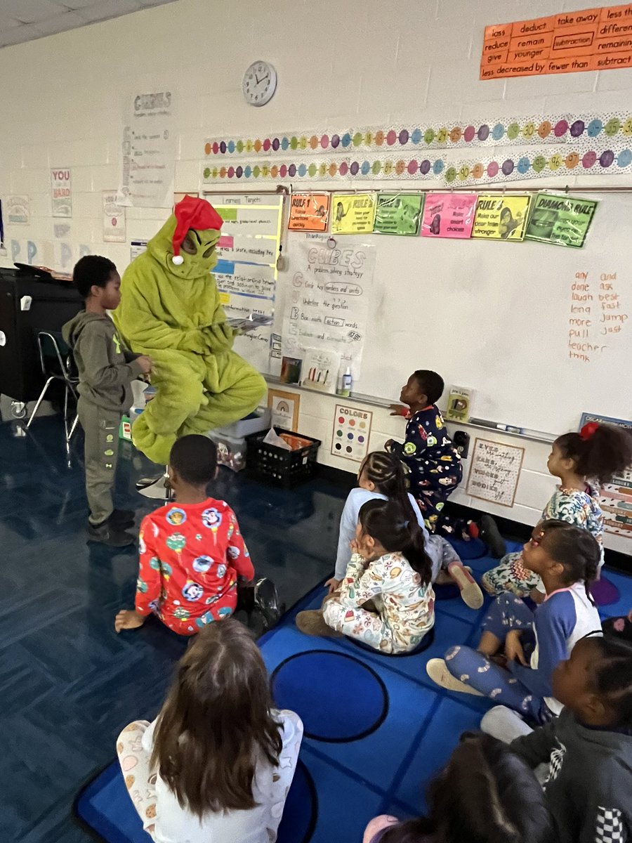 garrison3_mrs's tweet photo. Today was an exciting day at UGE! We had Polar Express Day. We wore our pajamas, watched Polar express and had hot chocolate. We also had a surprise visit from the Grinch. 
#winningforkids https://t.co/V7Ckmuq87V