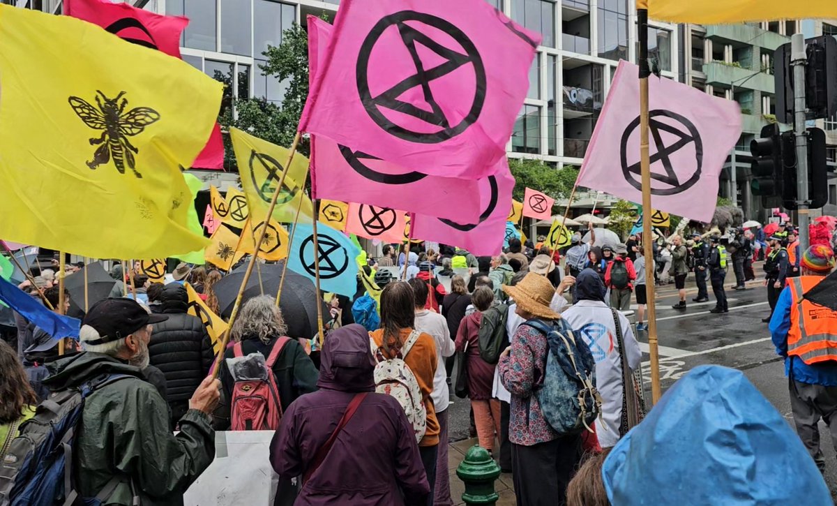 lukebuckmaster's tweet photo. Big #extinctionrebellion protest in Melbourne - slow march through city ended with large group sitting on road in front of Flinders St station. Many arrests including prominent philosopher and author Raimond Gaita #climateactionnow #COP28 https://t.co/7QMfMzU7If