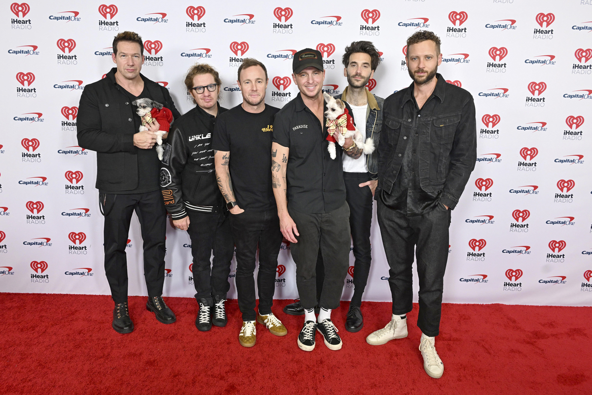 iHeartRadio's tweet photo. Looks like @OneRepublic got a few new members 🐶🐶

Set a reminder for Dec 21st to watch the #iHeartJingleBall2023 on ABC! #iHeartOnABC

📸: Dave Kotinsky/Getty https://t.co/2B7bWCC7sv