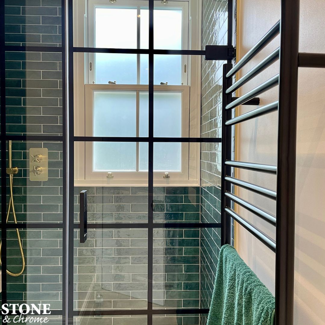 Industrial meets chic 😍 - Roman Crittal style shower door with inline panel. - 'Lume Green' tiles by Minoli. - Ladder towel rail in Matt Black. - Coalbrook Bank shower valve and handspray in Brushed Brass. --- 📧 enquiries@stoneandchrome.com 💻 stoneandchrome.com