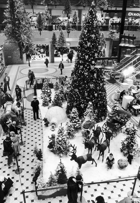 Christmas tree and display in Halle Square, in the Arndale Centre, Manchester. December 1987.