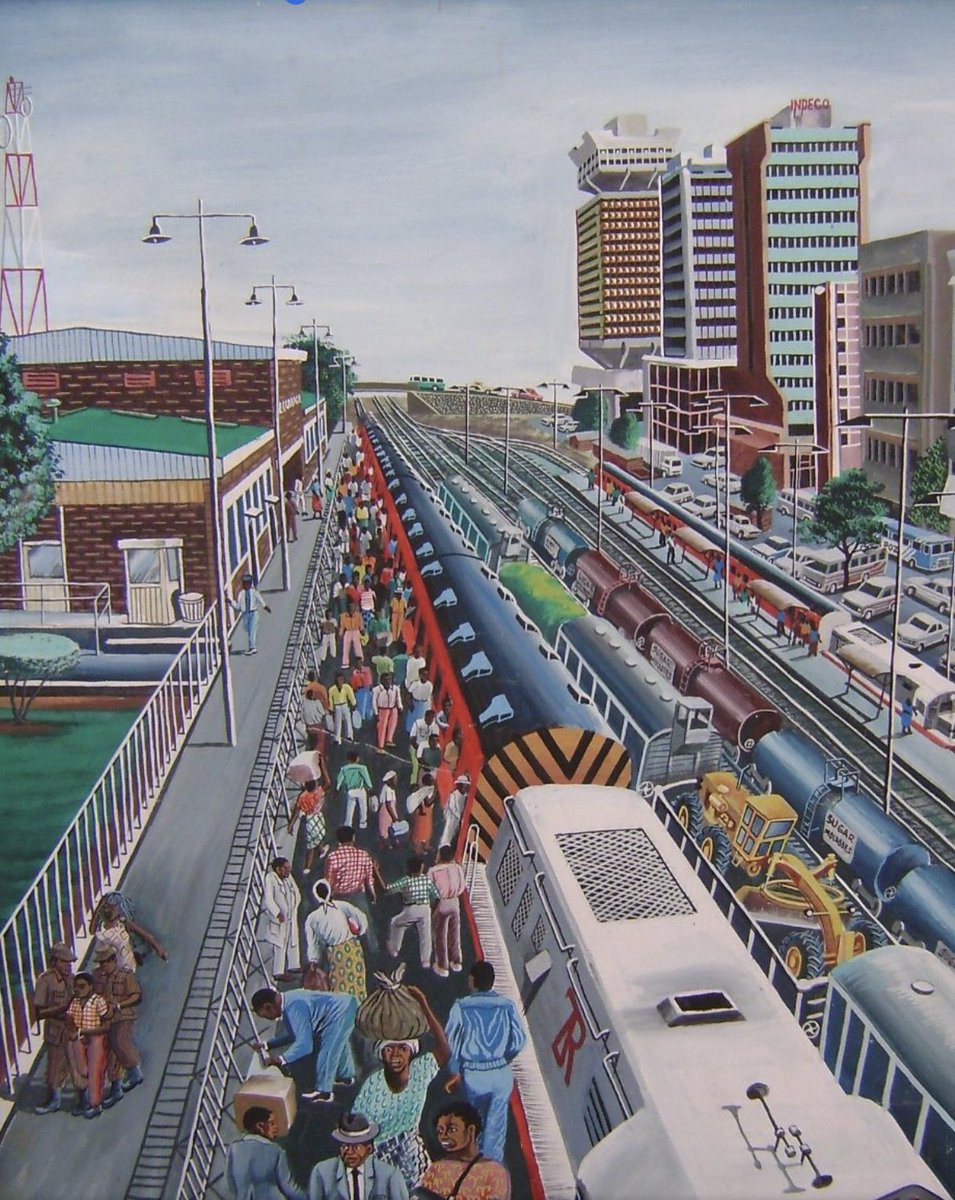 Henry Mulenga’s captivating artwork ‘Lusaka Rail Station’ (c. 1990) evokes a sense of nostalgia. 
The mesmerizing aerial perspective he paints from is truly enchanting. A beautiful tribute to the golden age of locomotion.