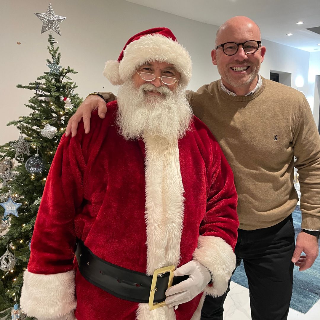When your Sales and Development Manager, Andy, takes the 'holiday spirit' to a whole new level during a client visit! 🎅 Looks like Santa is planning to trade his North Pole digs for a cosy iHus annexe. 🏡 

#annexe #gardenannexe #customervisit #annexe #santa