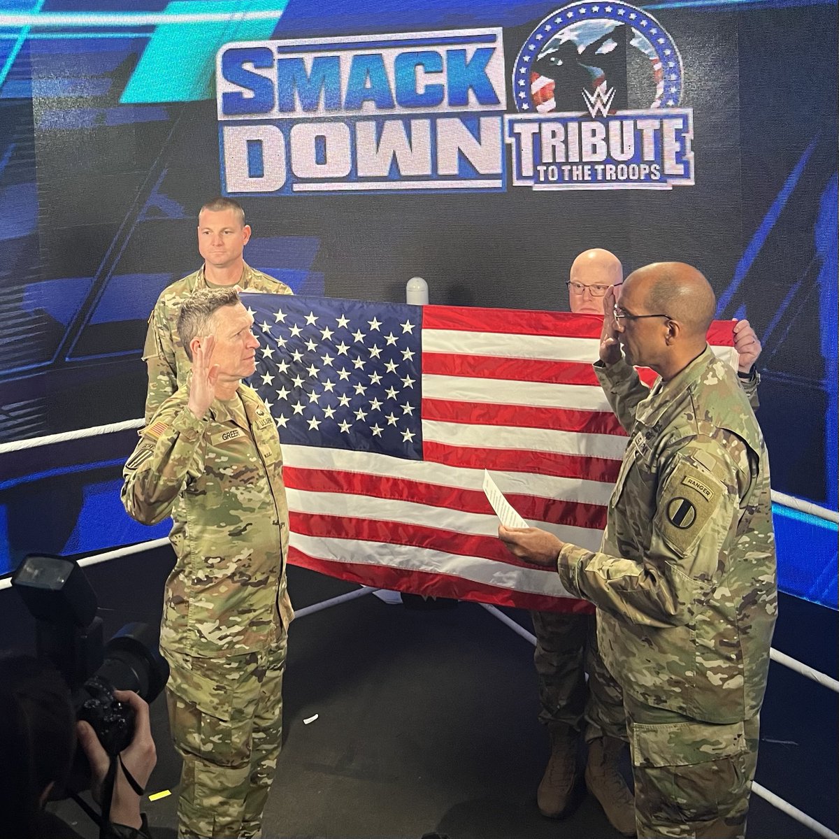 USArmy's tweet photo. @cmorganmusic is appointed to Warrant Officer by Gen. Gary Brito, @TradocCG, during @WWE's Tribute to the Troops Dec. 8. https://t.co/ittgDklTTH