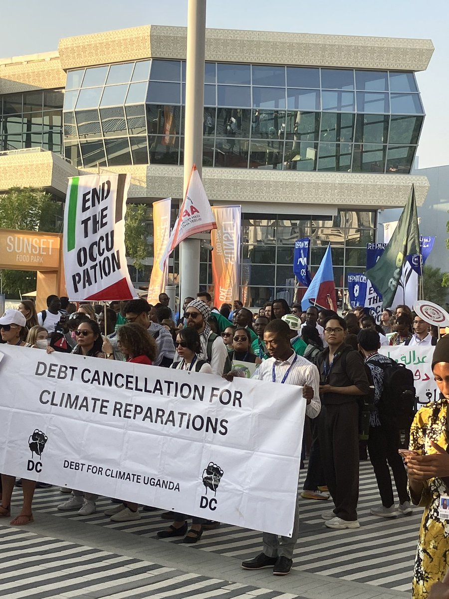 MQadrdan's tweet photo. A rather big protest in blue zone #cop28 on 9th Dec. #ceasefire #LossAndDamage fund #ClimateDebtCancellation #JustTransition were demanded. https://t.co/EthiNyQrSt