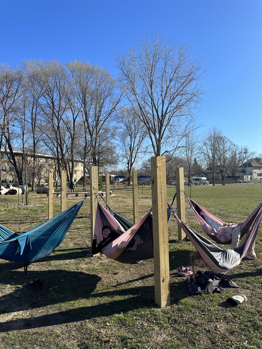 RiversideOtters's tweet photo. Hammocks in December?! It's not unheard of at Riverside Elementary, especially if it's an unusually warm day.  Ms. Robinson's Social Skills class enjoyed the chance to take learning outside. https://t.co/ZDu6AHAZCU