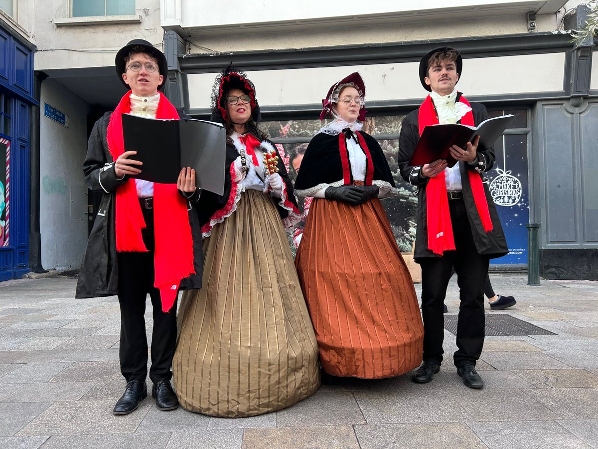 DubCityCouncil's tweet photo. If you see these 4 festive peeps in town ask them for a tune. Supposedly, they do a very good rendition of Mariah Carey's, "All I Want for Christmas" 😉 https://t.co/7rDssfWGKS