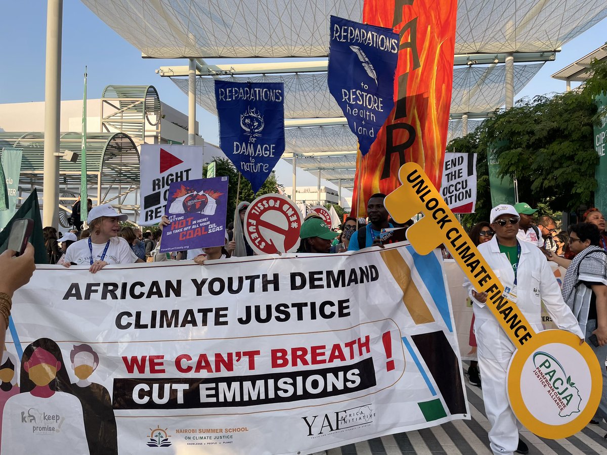 meganrowling's tweet photo. At #COP28 in Dubai, activists held a march calling for #climatejustice, a phase-out of fossil fuels, nature protection, human rights and more climate finance. Many also demanded a ceasefire in Gaza. Here’s what it looked like! https://t.co/WP6V5C0LdS