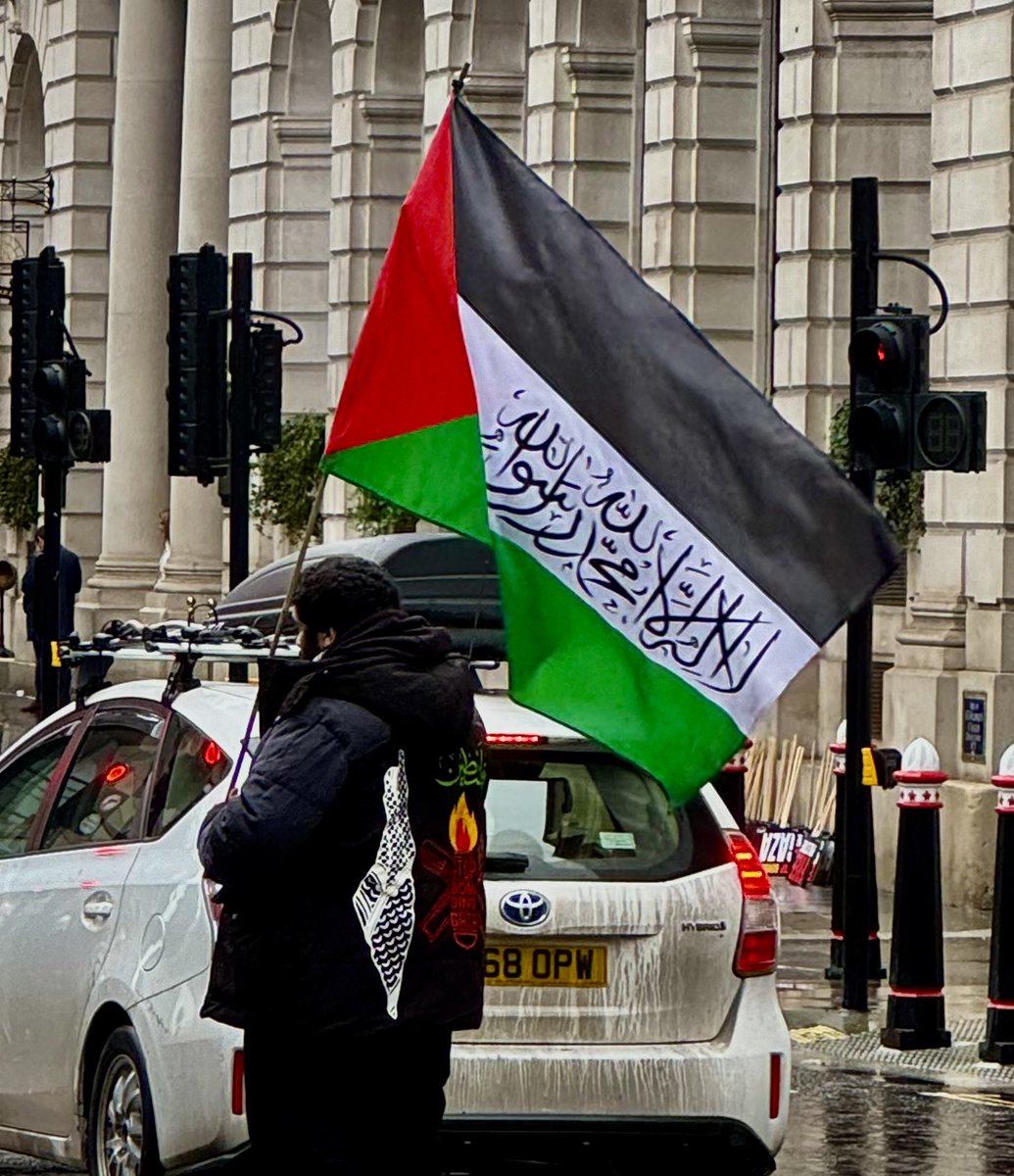 JohnnieM's tweet photo. Well, I had lots of interesting experiences in London wandering around the beginning of a “From the River to the Sea” protest.  

Socialist & Communist Parties— everywhere! More communist/socialist organizing tents than Palestinian ones (who is funding those groups?). Open calls for the non-existence of Israel.  I saw no one advocating for a two state solution. 

Plenty of nice, sincere young people, & totally clueless. Scores of craven, cynical adults who have decided to use the Palestinians as a symbolic, ideological human shield in the way Hamas continues to do so —literally. 

And I did see real & alarming Islamism, I feel sorry for my normal Muslim friends (the vast vast vast majority of Muslims) because of the way these extremists are defaming all Muslims & also highjacking their own ambitions. What I saw in London fuels Islamophobia. 

It was all rife with antisemitism, of course, but cleverly I heard an Islamist guy yelling on a megaphone “anti-Zionism is NOT antisemitism.” Of course, anti Zionism is antisemitism. Then, the same guy immediately advocated for the elimination of Israel “from the river to the sea” in favor of a Palestinian state where “all people can coexist, whatever their religion.” This guy was not naive. He was absolutely sinister.  He was also chanting against Biden, Sunak & — Jordan’s King Abdullah II & Egypt’s Sisi!

No one wanted to talk about the hostages held by Hamas or October 7. It is as if none of it exists, none of it happened…just astonishing. Worse i saw lots of “right to resist” paraphernalia in all the tents, but especially the socialist ones!

What was also astonishing was watching older, white socialists handing antisemitic signs to young, modern Muslims which said “from the river to the sea.”

A few folks asked me if I cared about the children in Gaza. I said, “yes, my heart is broken for every child in Gaza. I care about all people, and that’s why I hate the way Hamas has chosen to sacrifice so many of their lives & has stolen so many of their futures … by choosing hate & terrorism. Hamas speaks openly about sacrificing them, they don’t even hide it. Gaza should have been Dubai. Instead it aspired to be ISIS.”

I did not see many “ceasefire” signs. I saw a pile of them but almost no one holding them. This wasn’t about a “Ceasefire” even if that’s what they call the protest. 

We need peace & justice in the Middle East for everyone, but — to put it mildly — what I saw isn’t how we get there. It is the opposite. 

I refuse to call what I saw a pro-Palestinian protest, despite lots of Palestinian flags. It was an anti-Israel, antisemitic protest organized by marxists, socialists, communists & Islamists preying on the humanitarian (if, uninformed) sympathies of young people and with the total cooperation of adults who should know better.
