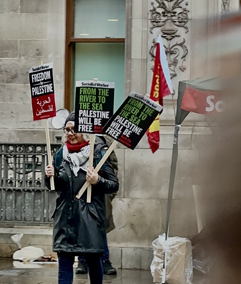 JohnnieM's tweet photo. Well, I had lots of interesting experiences in London wandering around the beginning of a “From the River to the Sea” protest.  

Socialist & Communist Parties— everywhere! More communist/socialist organizing tents than Palestinian ones (who is funding those groups?). Open calls for the non-existence of Israel.  I saw no one advocating for a two state solution. 

Plenty of nice, sincere young people, & totally clueless. Scores of craven, cynical adults who have decided to use the Palestinians as a symbolic, ideological human shield in the way Hamas continues to do so —literally. 

And I did see real & alarming Islamism, I feel sorry for my normal Muslim friends (the vast vast vast majority of Muslims) because of the way these extremists are defaming all Muslims & also highjacking their own ambitions. What I saw in London fuels Islamophobia. 

It was all rife with antisemitism, of course, but cleverly I heard an Islamist guy yelling on a megaphone “anti-Zionism is NOT antisemitism.” Of course, anti Zionism is antisemitism. Then, the same guy immediately advocated for the elimination of Israel “from the river to the sea” in favor of a Palestinian state where “all people can coexist, whatever their religion.” This guy was not naive. He was absolutely sinister.  He was also chanting against Biden, Sunak & — Jordan’s King Abdullah II & Egypt’s Sisi!

No one wanted to talk about the hostages held by Hamas or October 7. It is as if none of it exists, none of it happened…just astonishing. Worse i saw lots of “right to resist” paraphernalia in all the tents, but especially the socialist ones!

What was also astonishing was watching older, white socialists handing antisemitic signs to young, modern Muslims which said “from the river to the sea.”

A few folks asked me if I cared about the children in Gaza. I said, “yes, my heart is broken for every child in Gaza. I care about all people, and that’s why I hate the way Hamas has chosen to sacrifice so many of their lives & has stolen so many of their futures … by choosing hate & terrorism. Hamas speaks openly about sacrificing them, they don’t even hide it. Gaza should have been Dubai. Instead it aspired to be ISIS.”

I did not see many “ceasefire” signs. I saw a pile of them but almost no one holding them. This wasn’t about a “Ceasefire” even if that’s what they call the protest. 

We need peace & justice in the Middle East for everyone, but — to put it mildly — what I saw isn’t how we get there. It is the opposite. 

I refuse to call what I saw a pro-Palestinian protest, despite lots of Palestinian flags. It was an anti-Israel, antisemitic protest organized by marxists, socialists, communists & Islamists preying on the humanitarian (if, uninformed) sympathies of young people and with the total cooperation of adults who should know better.